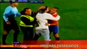 Hinchas extasiados de fútbol