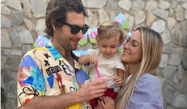 María Grazia Gamarra con su esposo y su hija Eva.